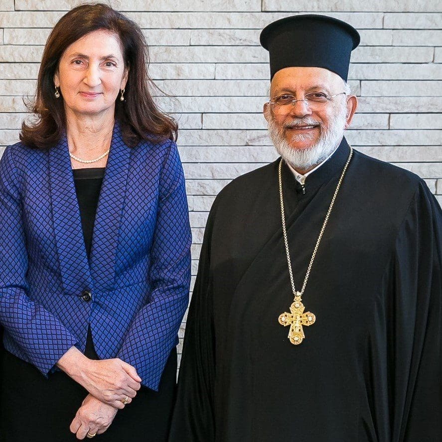 Mrs Amelia Katsogiannis Head of College with the Very Reverend Father S. Scoutas